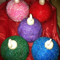 Christmas Ornaments My version of christmas ornaments...instead of using cake i use rice krispies cereal..and i covered it with sugar sprinkles...