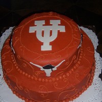 Long Horns UT graduation cake. butter cream with gumpaste peices.