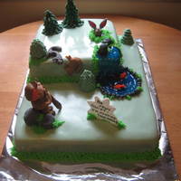 Sqwirrel Hunting French vanilla cakes, strawberry and peach buttercream fillings..fondant and gumpaste for all the decorations..buttercream grass......