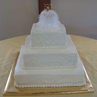 First Wedding Cake first wedding cake. actually done for a 50th wedding anniversary. the couple did not have a wedding cake so their family ordered one for...