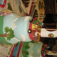 Wonderpets Gumpaste figures and boat with much of the details piped on the cake with royal icing.