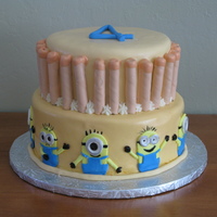 Nerf And Despicable Me My son was having a nerf gun party and really loved Despicable Me so wanted both represented on his 4th birthday cake. The top layer is...