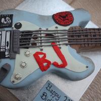 Green Day Guitar Cake A cake replica of Billie-Joe (from Green Day) guitar for a 21st Birthday girl! The real guitar picture is in the extra photos.