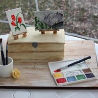 Watercolour Painting Cake The box is ginger cake with orange buttercream filling. I handpainted the box and board (covered in fondant) with fool colouring diluted in...