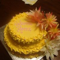 Cakes_003.jpg yellow cake, whipped vanilla icing, flowers in two flower spikes