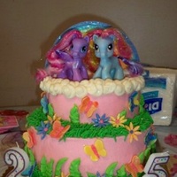 My Little Pony My Lil Pony cake for two sisters. Buttercream with fondant/gumpaste accents. The rainbow is colored gumpaste that I cut into strips and...