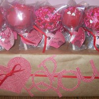 Valentine Cake Pops Triple Chocolate Cake Pops with red candy coating and Valentine's sprinkles. I made these for my sons and my nephew to take to school...