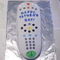 Father's Day "clicker" Cake This started out as a 9x13 cake. After cutting, carving, and covering with marshmallow fondant, it ended up looking remarkably like Hubby&#...