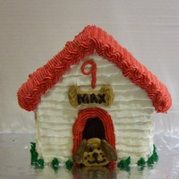 In The Doghouse This was created using a Wilton Stand-up House pan. My son chose this design for his 9th birthday. He insisted on our dog's name...