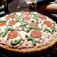 The Pizza Cake For my son's 10th birthday, I decided to make a cake depicting his favorite food. The sauce is buttercream frosting, the cheese is...