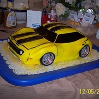 Bumblebee Transformers Cake I made this for my sons 4th birthday :) He loved it, it did have alot of difficulties but it turned out great.