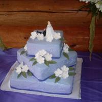 Purple Plumeria Cake This is the second buttercream cake I've done, and I am really pleased with how it came out. It is a 3 tier champagne cake with light...