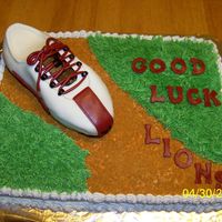 Girls Track Team Cake Butter cream Icing and Marshmallow Fondant for the shoe.