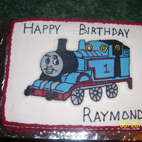 Thomas The Tank Engine I made this for my nephews birthday party. It is buttercream icing with frozen transfer. tfl