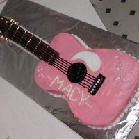 0306092202A.jpg I made this cake for my niece's 10th birthday. This was my first attempt at a guitar cake and was surprised at my results. Cake is...