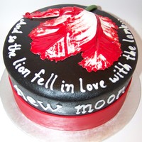 New Moon Cake 8-inch round, covered in marshmallow fondant with a hand-sculpted orchid on top to match that on the book cover of New Moon.