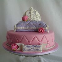 Princess Tiara On Pillow Chocolate raspberry swirl cake with raspberry and cream cheese buttercream filling. 10" base and 6" pillow. Homemade fondant and...