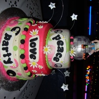 Roller Skate/60's peace love adn party, fondant cake w/ rice crispy disco ball. and hand made fondant girl !