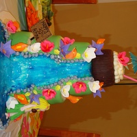 Waterfall 3 t, carrot cake/lemon cake buttercream/ fondant. fondant flowers.RCT coconut.