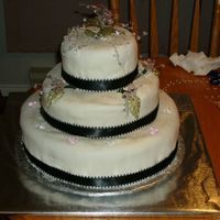 Black And White Cake My second attempt at a wedding and have not used fondant in a year. I need to practice more if I am going to get better.