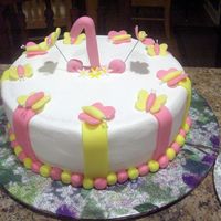 1St Birthday Butterflies Cake Covered in buttercream with fondant accents.