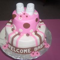 Baby Shower Cake Covered in buttercream with fondant accents!