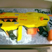 Nerf Cake My hairdresser wanted a nerf gun cake for her son, his fav is the long shot but they only needed 10-15 servings so I modified the gun to be...