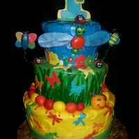 Buggie Cake A photographer friend of mine found a pic of a cake she liked bit wanted the bugs to be from her childs invitation. She loved the result.