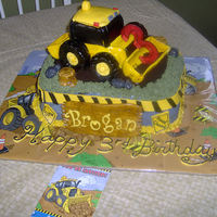 Tractor Cake Just finished, marble cake with buttercream filling, covered with buttercream, rice krispie treat tractor covered with fondant and fondant...