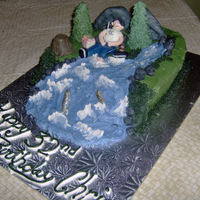 Fishing Cake Vanilla cake with buttercream filling covered in buttercream with fondant accents.