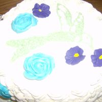 Humming Bird Pic I did this cake in my final class in Wilton Course Two decoration. I had a rose mess up and the cake shape, also had to recover it with...