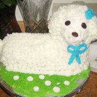 Easter Lamb Cake This was my first attempt at a 3-D cake figure. I used Wilton Cake Lamb Pan. Also home made butter cream done rossett style fur with raisin...