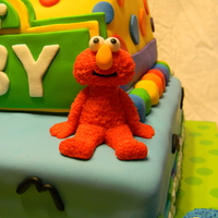 Sesame Street 1St Birthday Cake Sesame Street themed 1st Birthday Cake. All figures are made with either all fondant or 50/50 with gumpaste.