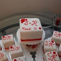 Red & White Mini-Cakes Mini-cakes are yellow cake with ganache filling; crumb-coated with vanilla bc and chocolate cake filled and crumb-coated with chocolate bc...