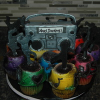 Hiphop Birthday Hip Hop dancers with boom box. Jumbo cupcake with fondant dancers. Boombox is rkt covered in fondant. This was my least favorite cakes ever...