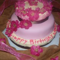 "pink Love" Mini 3 Tier Birthday Cake I made this for a friends Birthday! Fondant and butter cream icing and those are silk flowers. :0)