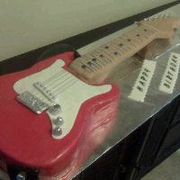 Red Guitar This was a challenge. It was life-size and really heavy. Chocolate wasc and covered in mmf. painted with luster dust.I used silver thread...