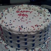 July_Cake.jpg Made this cake for the 4th of july. It's a white cake with fudge filling. I wanted to practice my basket weave. Cake is BC and the...