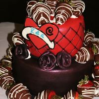 First Grooms Cake This was my first stacked cake and my third fondant cake. It has its issues and I need LOTS more practice. It was fun to make though !