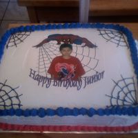 Spider Man Cake this is my first sheet cake 1/2 sheet with an edible image in the middle the frosting is frost and pride thats what the mom wanted so I...