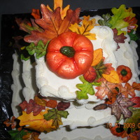 Fall Leaves And Pumpkins The tiers are 4' ,8', and 12' frosted with butter cream. The leaves and pumpkins are all gum paste painted with Wilton...