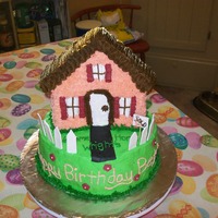 New House Cake This is a cake that I made for my cousin and her husband when they moved into their new house. They day they moved in also happened to be...