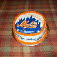 Mets Cake Cake I made for a friend's husband. Chocolate cake with Buttercream icing, Skyline and Mets logo are made out of fondant