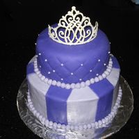 Purple Cake With Tiara So this was my first cake using some of the techniques I learned here. The bottom layer is buttercream smoothed with the VIVA method. I...