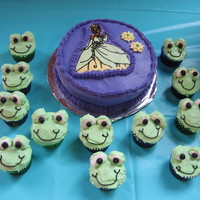 Princess Tiana And Frog Cupcakes All buttercream. Princess Tiana using FBCT. Frog cupcakes using marshmallows cut in half for eyes.