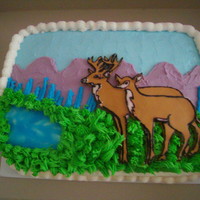Deer Cake yellow cake, rolled buttercream deer, buttercream icing