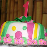 First Birthday Cake This is the cake that topped my baby's first birthday cupcake tower. I didn't calculate the tower's height, the cake was too...