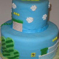 Mario Cake Blue MMF depicting the Mario Brother's background. This cake was for my step son's 11th birthday. He loved it!!