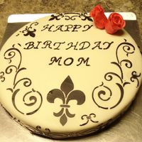 Fleur De Lis Cake Birthday Cake White MM Fondant with Buttercream stencil accentsRoses made from gumpaste