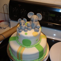 Elephant Fun cake for friend's baby shower - color scheme to match invitations w/ elephants in fondant.